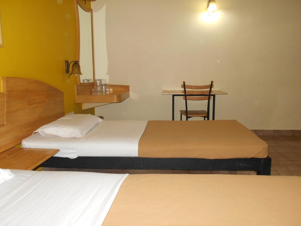 Tom'S Hotel Bangalore Kamer foto