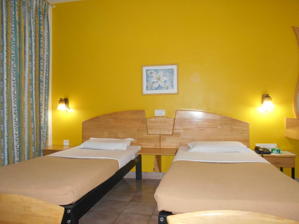 Tom'S Hotel Bangalore Kamer foto