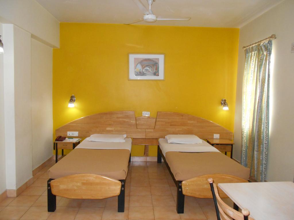 Tom'S Hotel Bangalore Kamer foto