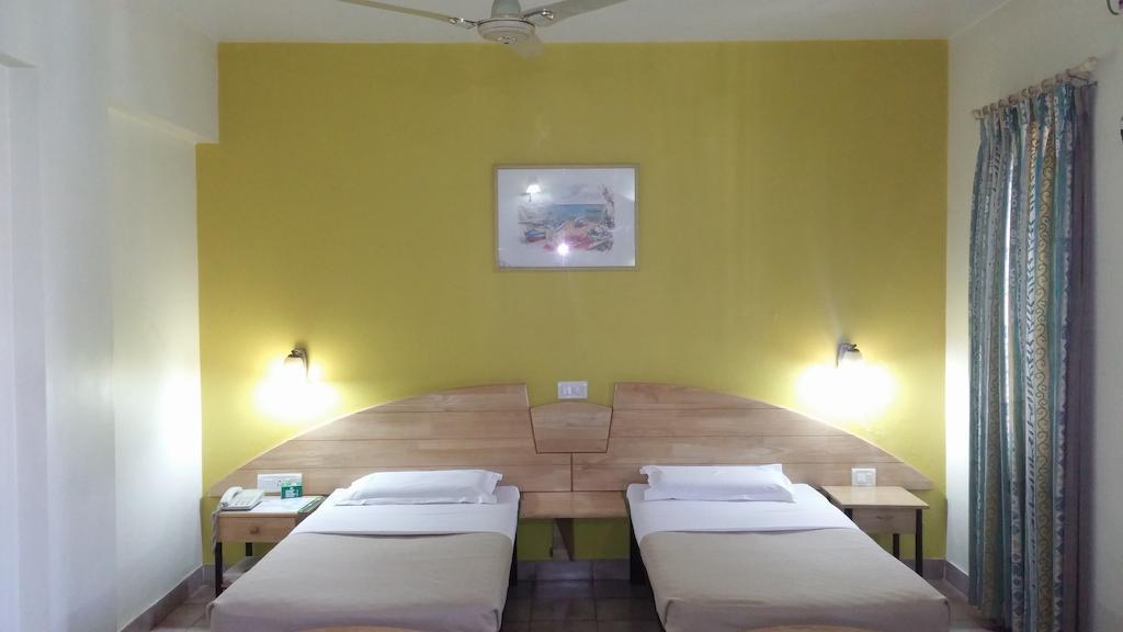 Tom'S Hotel Bangalore Kamer foto
