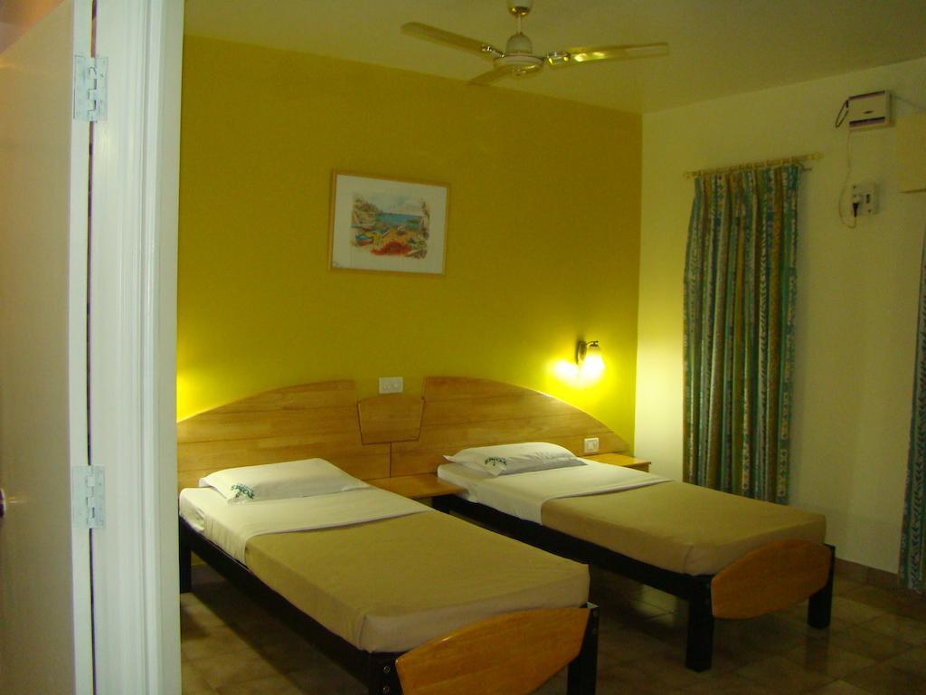 Tom'S Hotel Bangalore Kamer foto