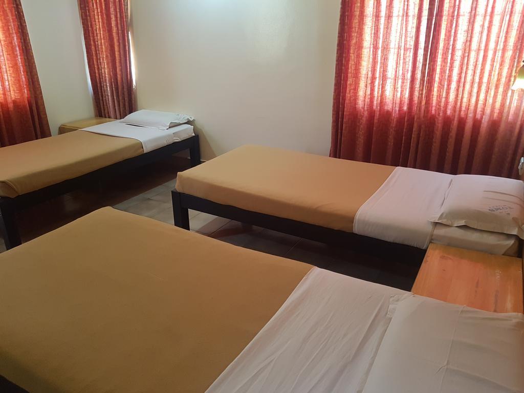 Tom'S Hotel Bangalore Buitenkant foto